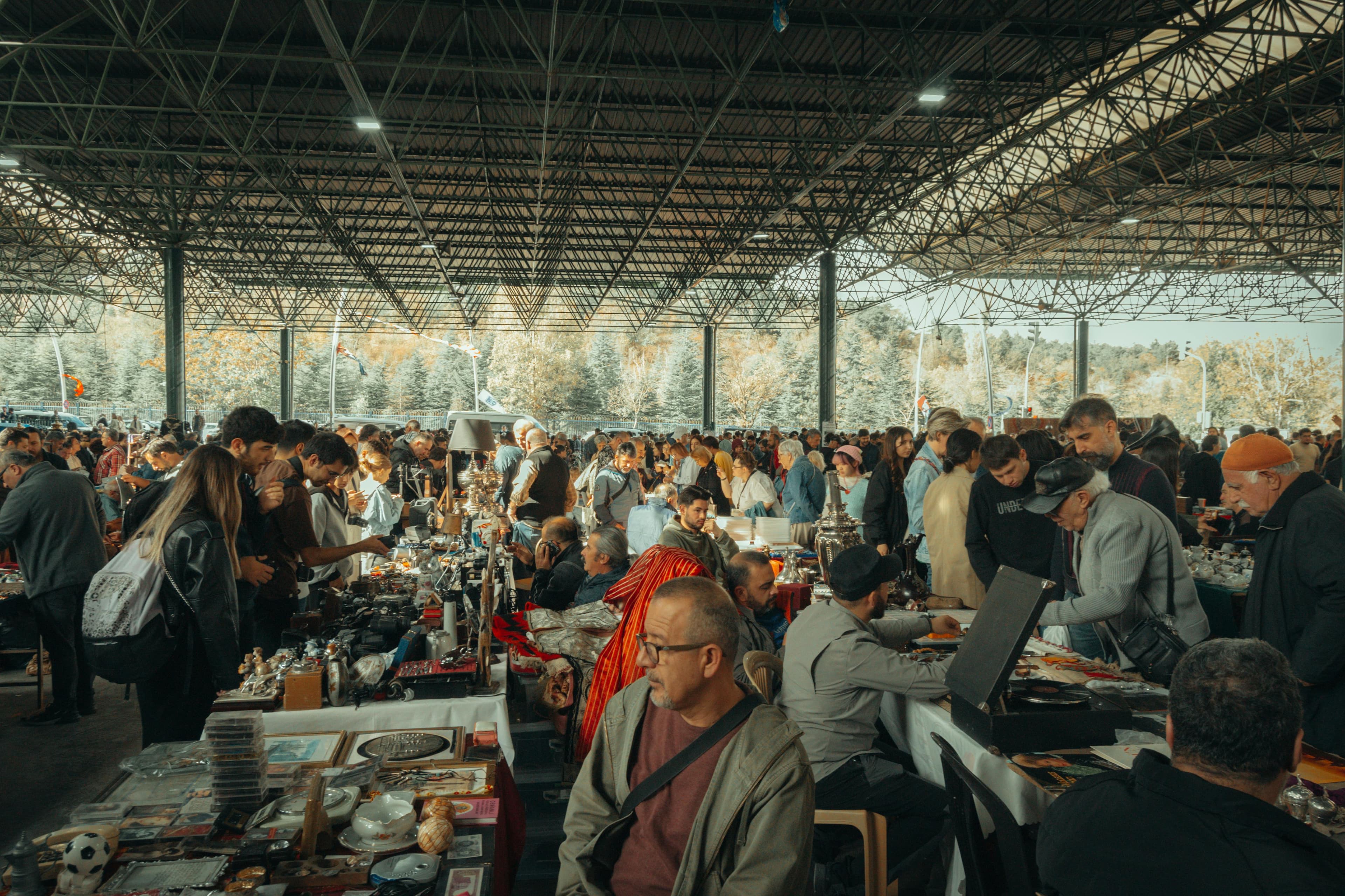 A bustling market scene, representing the diversity of human stories.